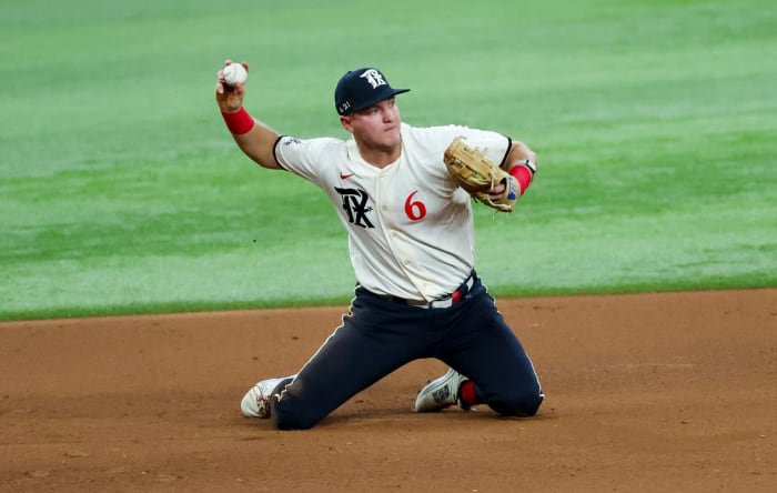 Jun 16, 2023; Arlington, Texas, USA; Texas Rangers third baseman Josh Jung (6) dives for the ball and makes a put out during the fourth inning against the Toronto Blue Jays at Globe Life Field. Mandatory Credit: Kevin Jairaj-USA TODAY Sports